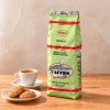 カフェン（CAFFEN）のコーヒー豆1kg入りの緑色パッケージと、エスプレッソ、白い皿に盛ったクッキー